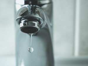 Image of a dripping tap - a common plumbing problem